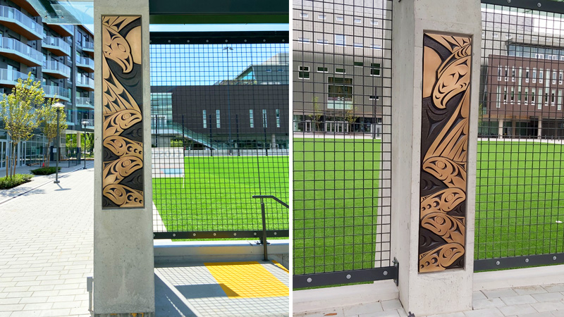 A photo of Brent Sparrow's ʔəlqsən (Point Grey) installation. It shows a bronze cast of salmon, thunderbird and salmon.